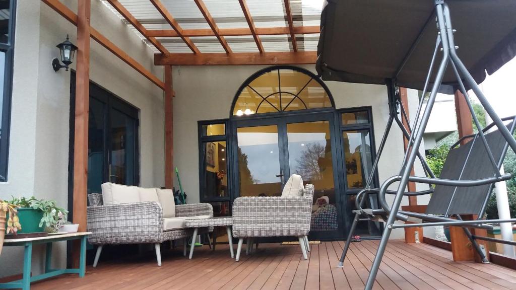 Posezení v ubytování Hamilton East Homestay
