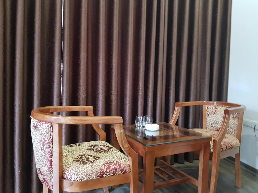 Posezení v ubytování X9 Hotel