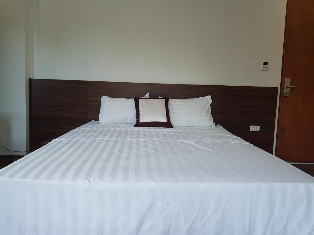 Postel nebo postele na pokoji v ubytování X9 Hotel