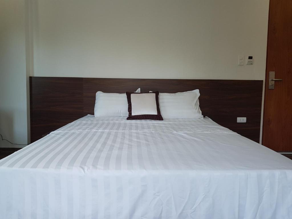 Postel nebo postele na pokoji v ubytování X9 Hotel