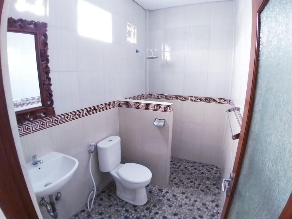 Koupelna v ubytování Muka House