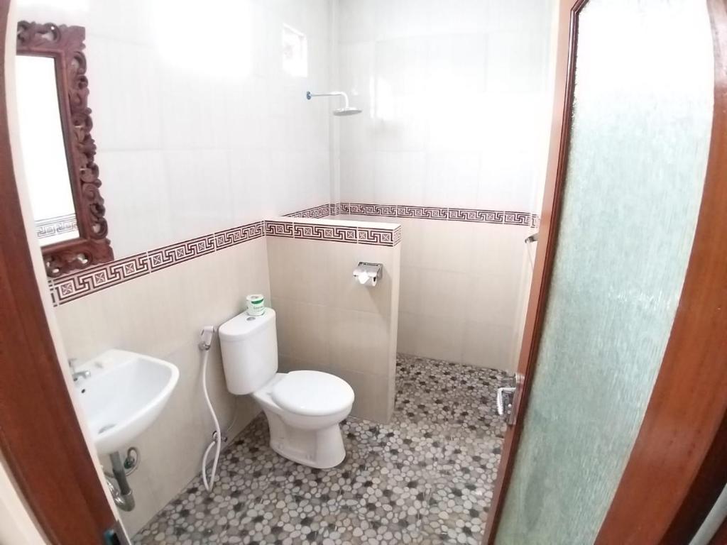 Koupelna v ubytování Muka House