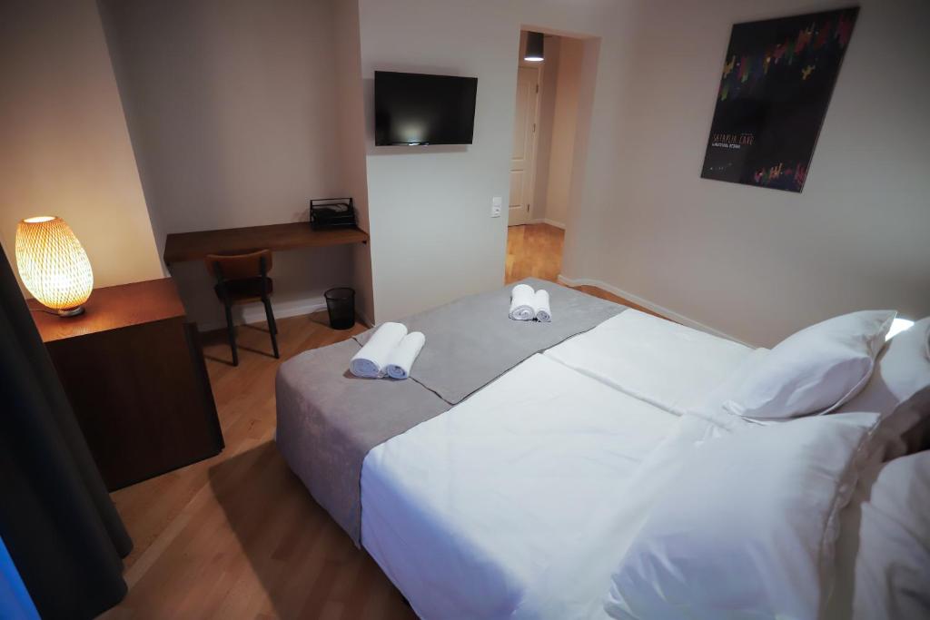 Postel nebo postele na pokoji v ubytování HOTEL SABU