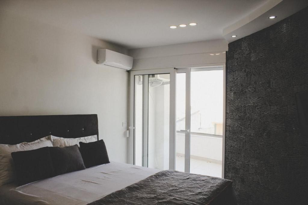 Uma cama ou camas num quarto em Villa la vie