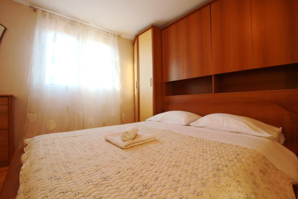 Postel nebo postele na pokoji v ubytování Apartment Lana & Ema