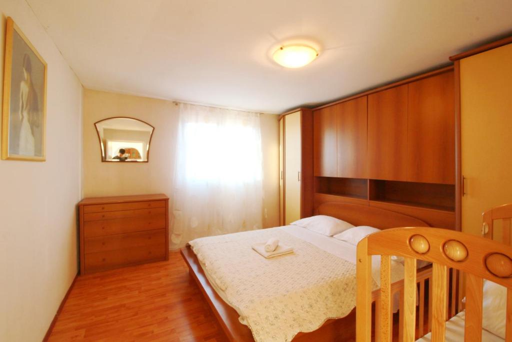 Postel nebo postele na pokoji v ubytování Apartment Lana & Ema