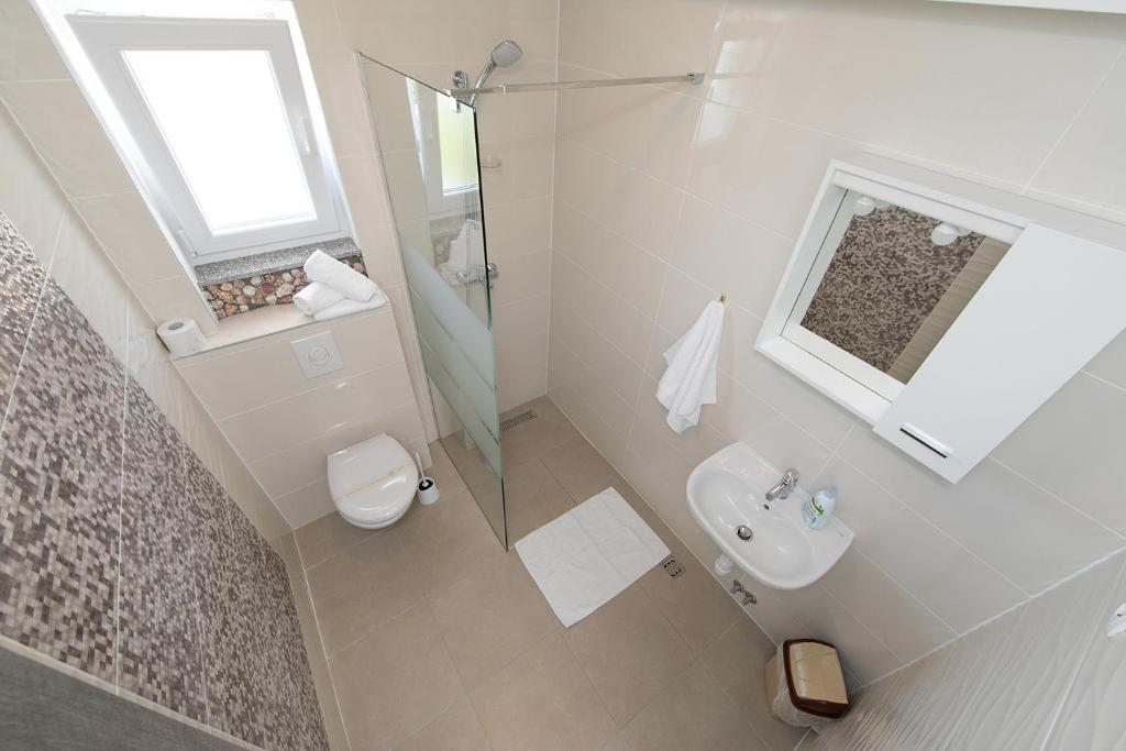 Kúpeľňa v ubytovaní Villa Orada