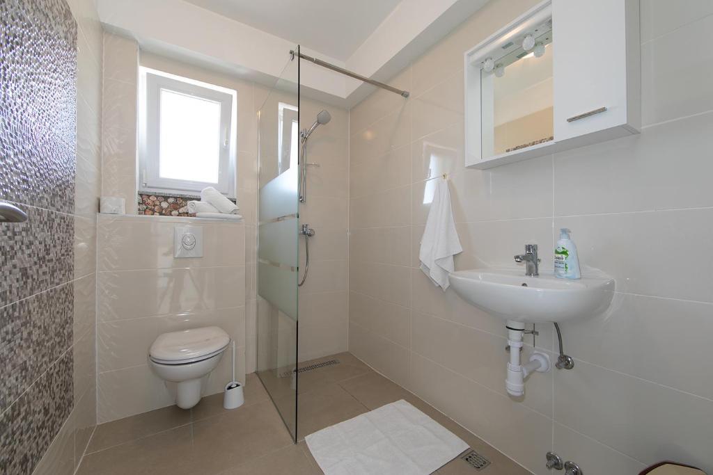 Kúpeľňa v ubytovaní Villa Orada