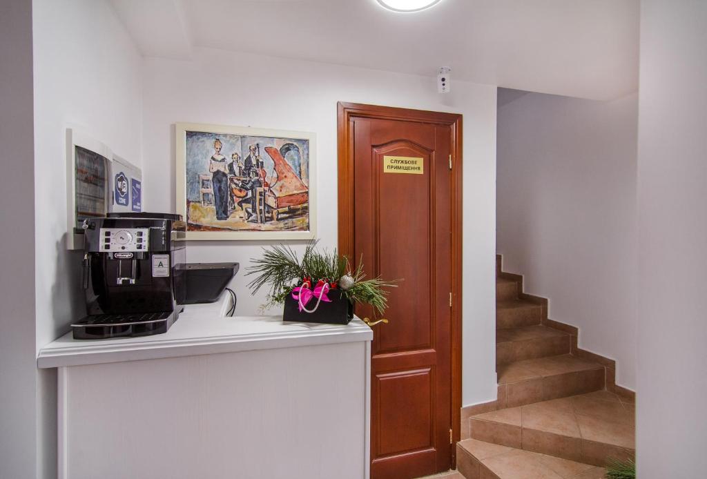 Kuchyň nebo kuchyňský kout v ubytování Apart Hotel Quartet