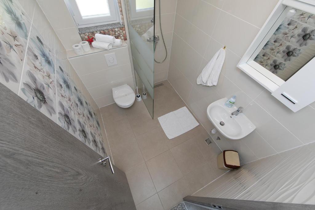 Kúpeľňa v ubytovaní Villa Orada