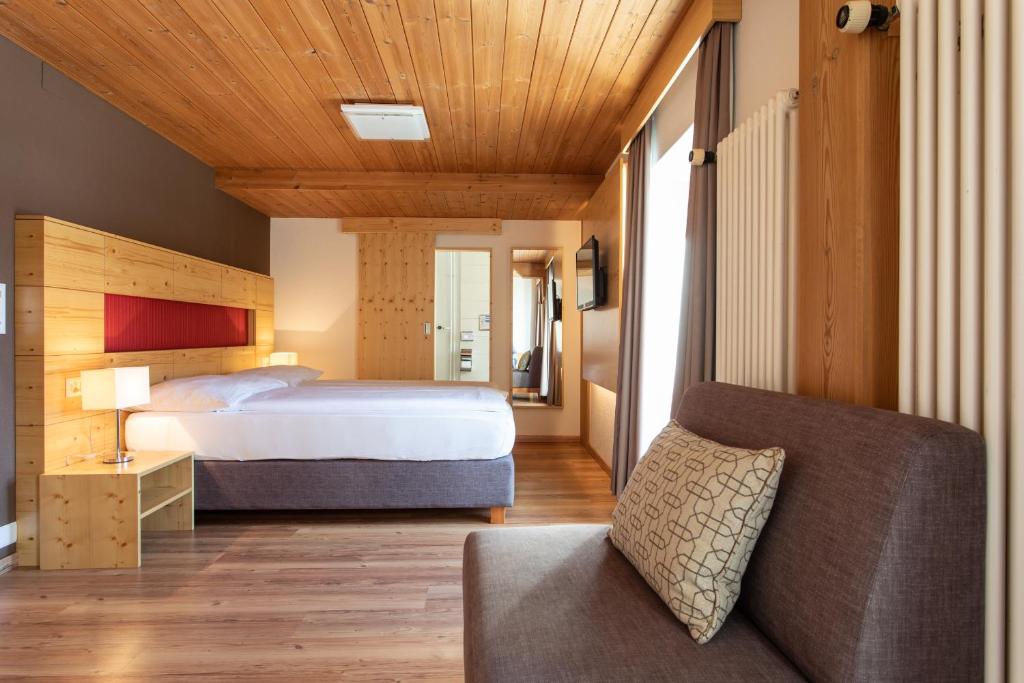 Postel nebo postele na pokoji v ubytování Meisser Lodge