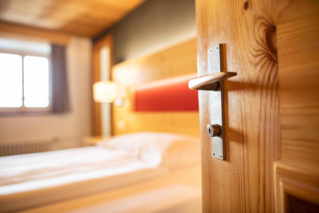 Postel nebo postele na pokoji v ubytování Meisser Lodge