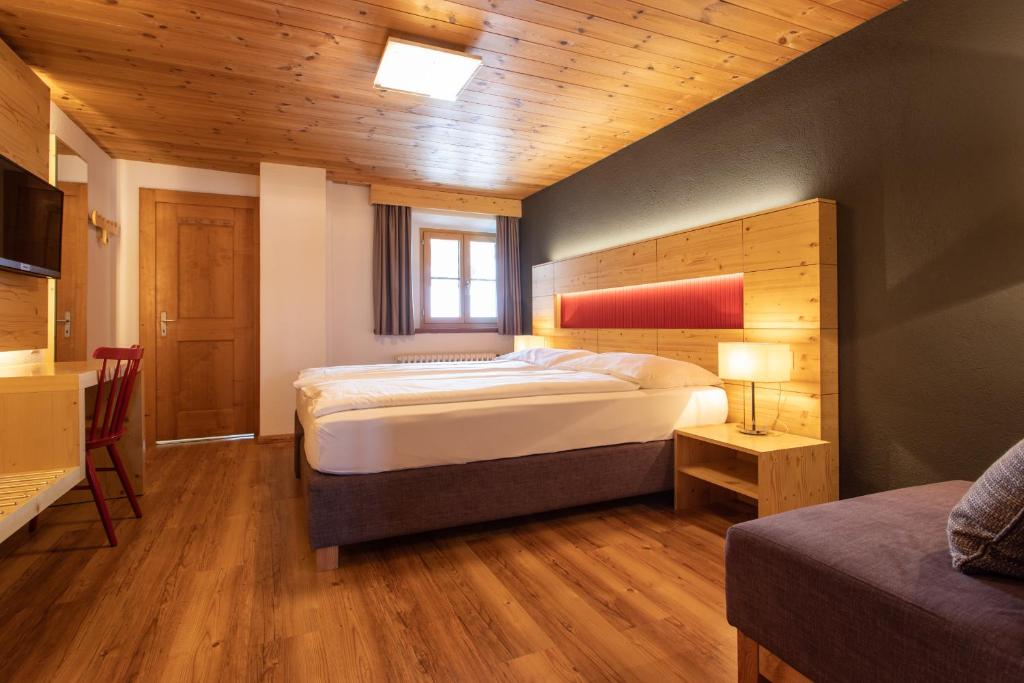 Postel nebo postele na pokoji v ubytování Meisser Lodge