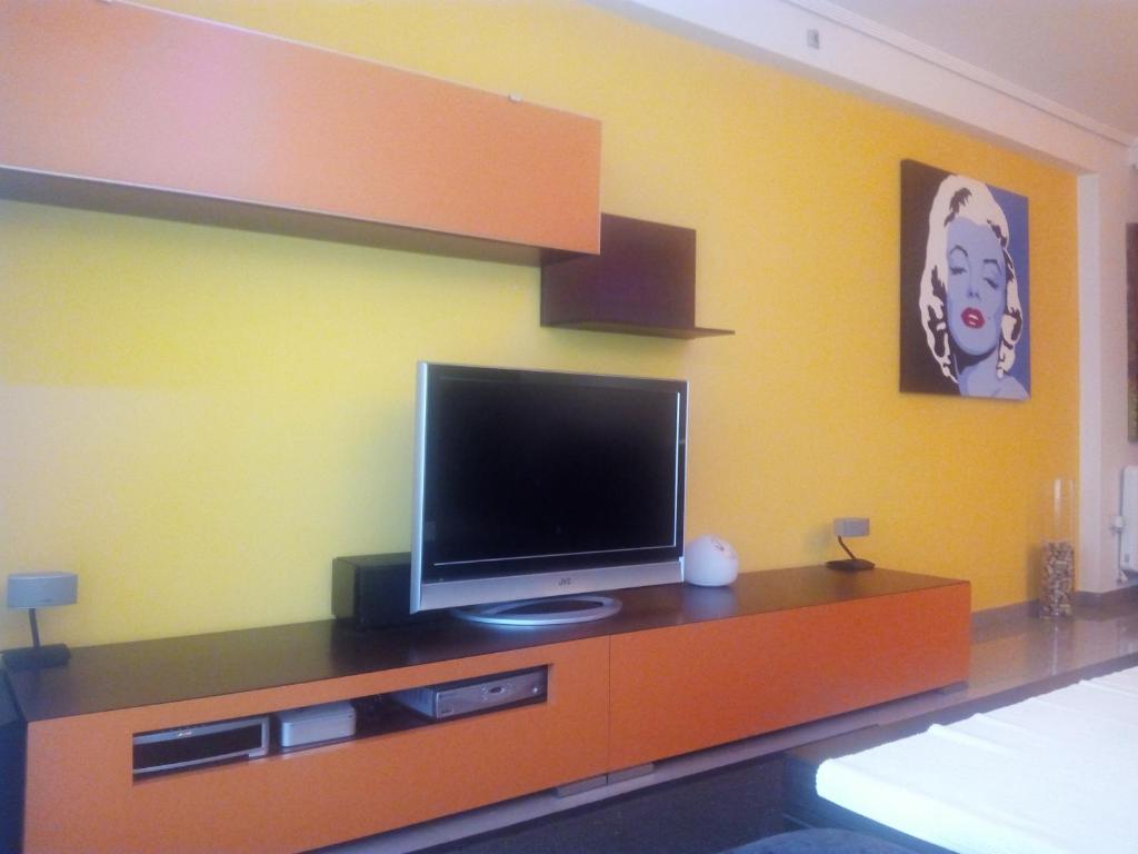 TV a/nebo společenská místnost v ubytování PATACONA MARE NOSTRUM APARTMENT