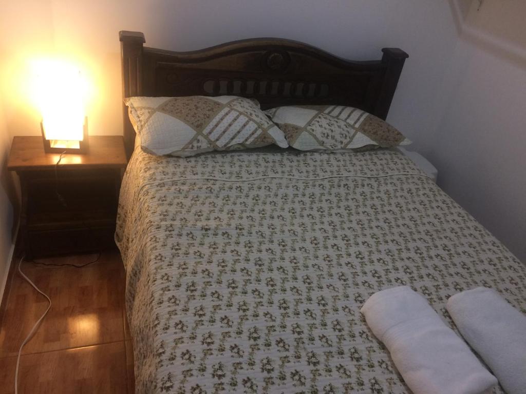 Postel nebo postele na pokoji v ubytování Casa D' Linda