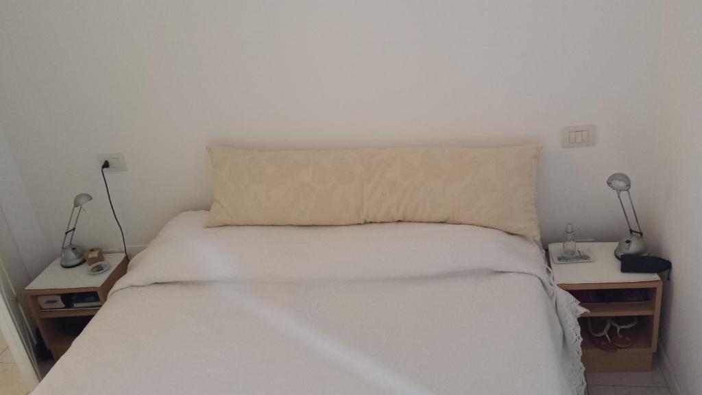 Posteľ alebo postele v izbe v ubytovaní Casa Lella