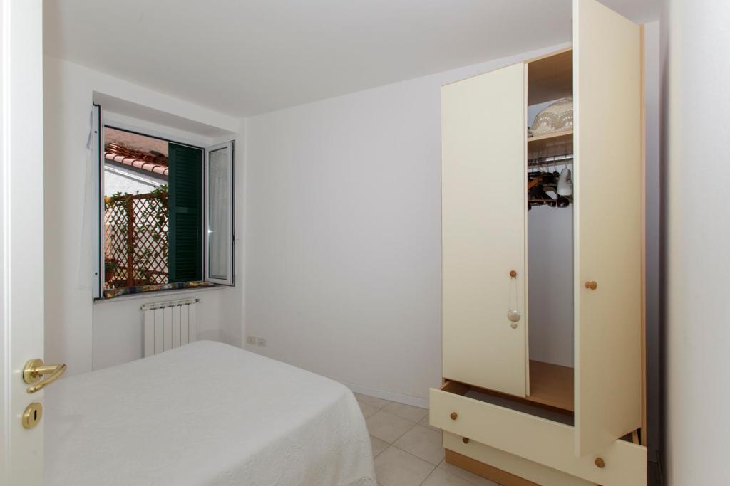 Posteľ alebo postele v izbe v ubytovaní Casa Lella