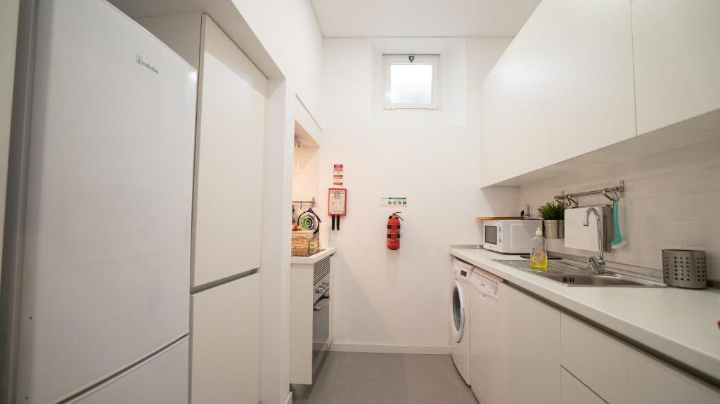 Kuchyň nebo kuchyňský kout v ubytování São Lázaro Lisbon Apartments