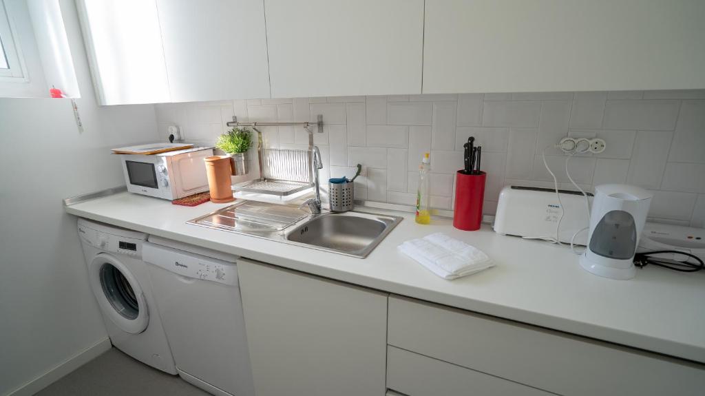 Kuchyň nebo kuchyňský kout v ubytování São Lázaro Lisbon Apartments