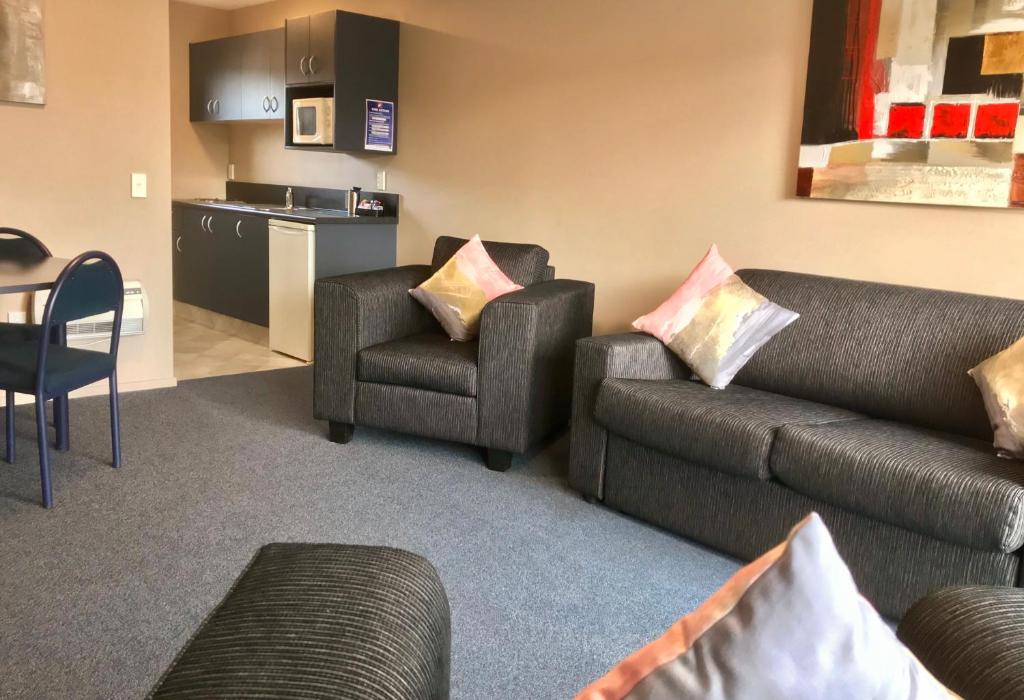 Kuchyň nebo kuchyňský kout v ubytování Phoenix Motels