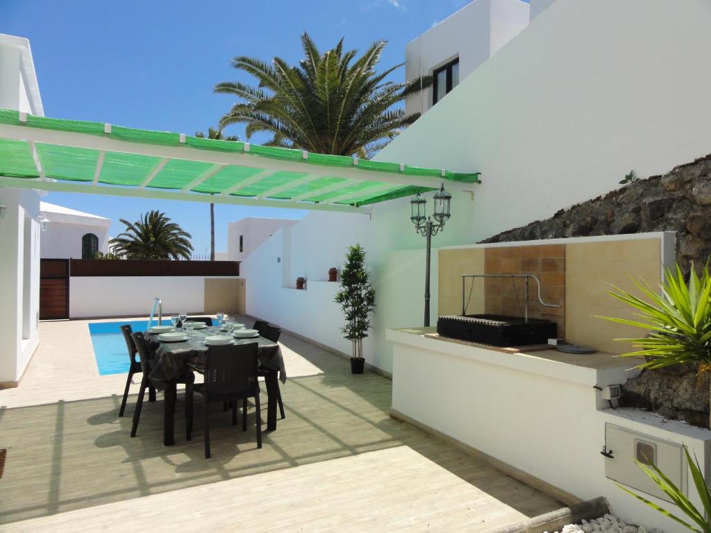 Patio alebo iná vonkajšia časť ubytovania Villa Santa Fe