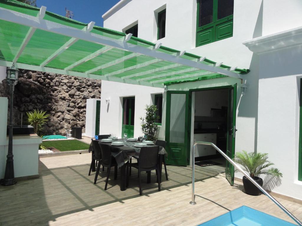 Patio alebo iná vonkajšia časť ubytovania Villa Santa Fe