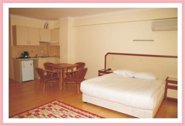 Кровать или кровати в номере Zeytin Apart Hotel
