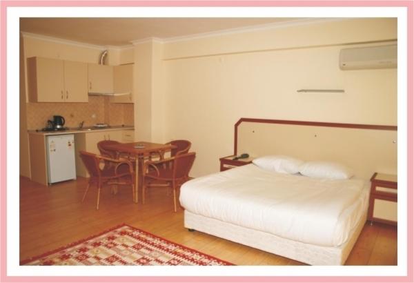 Kuchyň nebo kuchyňský kout v ubytování Zeytin Apart Hotel