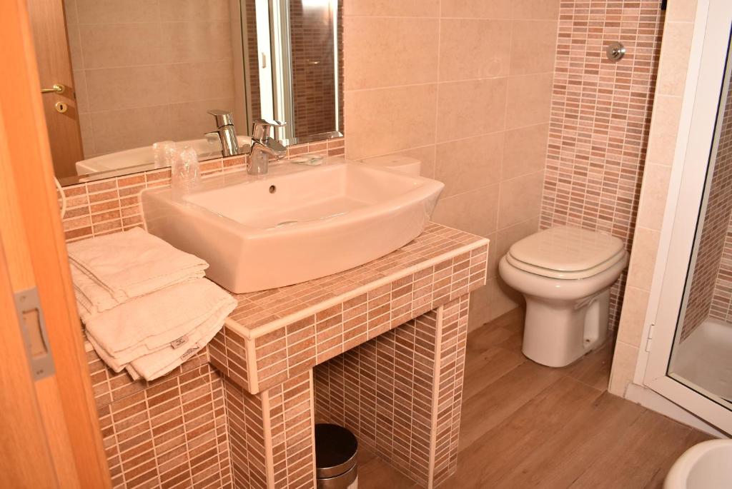 Koupelna v ubytování Hotel Miravalle