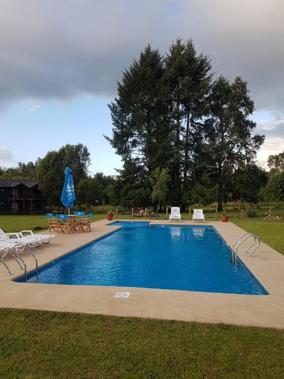 Bazén v ubytování Terra Newen Pucon Family Suites nebo v jeho okolí