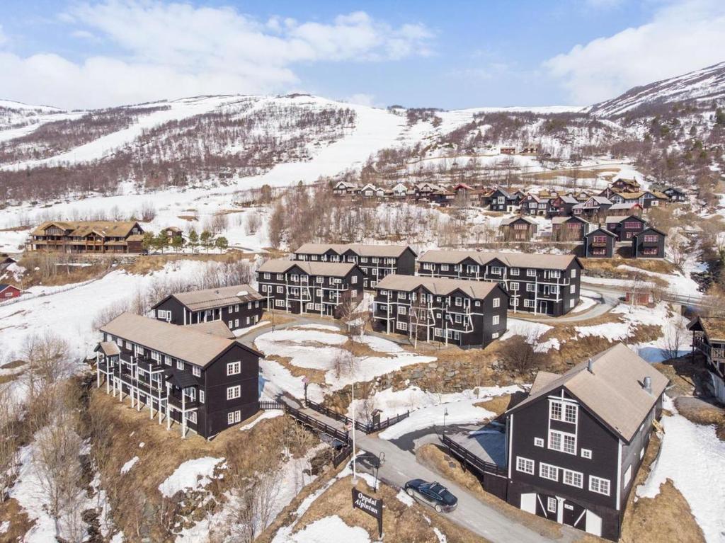 an aerial view of a resort in the snow at Oppdal Alpintun, Stølen øvre - ski in ski out in Oppdal