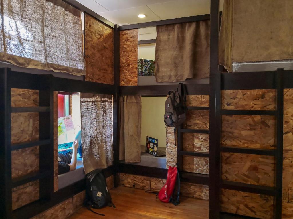 Postel nebo postele na pokoji v ubytování Spinning Cat Hostel