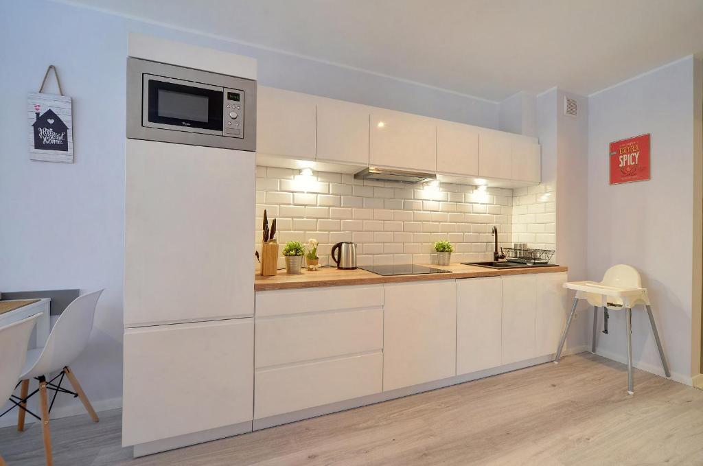 Kuchnia lub aneks kuchenny w obiekcie Apart-Invest Apartament Oslo