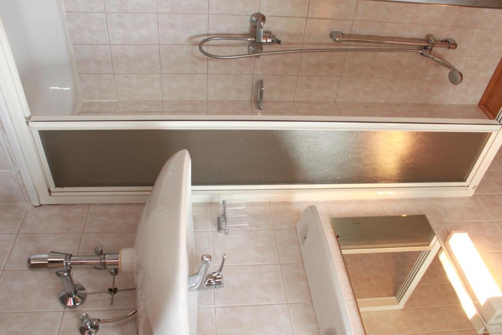 Koupelna v ubytování Hotel Stecher