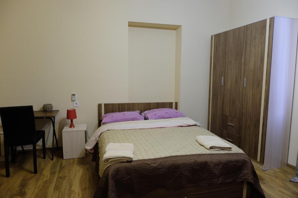Postel nebo postele na pokoji v ubytování Mia B&B Old Tbilisi