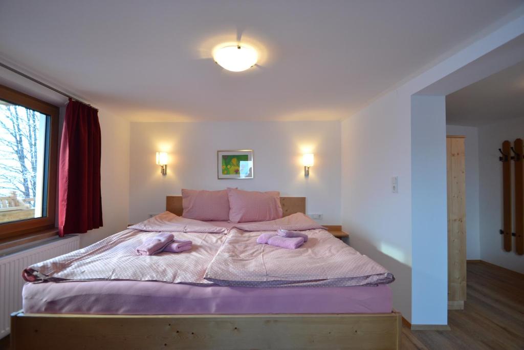 Postel nebo postele na pokoji v ubytování Ferienhaus Rieder