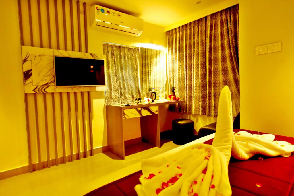 TV a/nebo společenská místnost v ubytování HOTEL KEK GRAND PARK