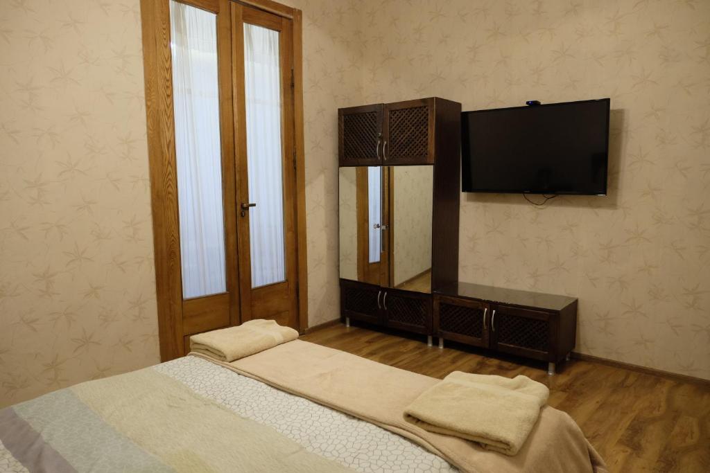 Postel nebo postele na pokoji v ubytování Mia B&B Old Tbilisi