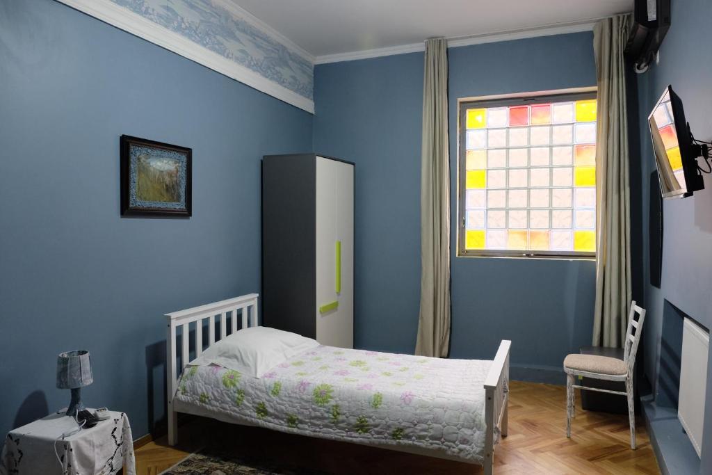 Postel nebo postele na pokoji v ubytování Mia B&B Old Tbilisi