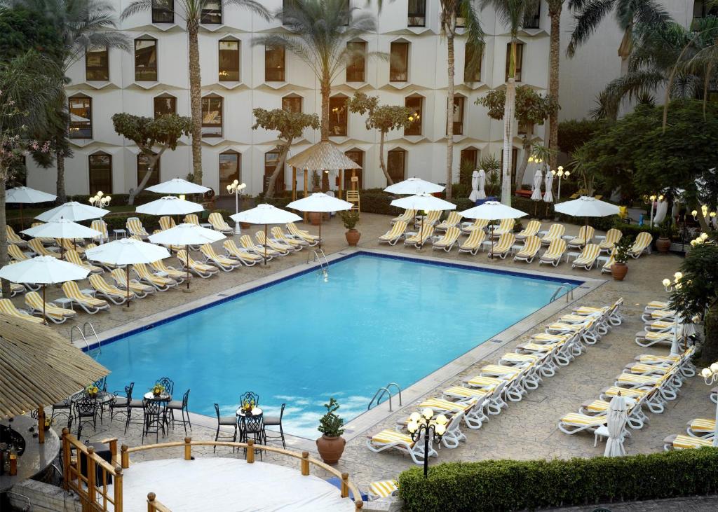 O vedere a piscinei de la sau din apropiere de Le Passage Cairo Hotel & Casino