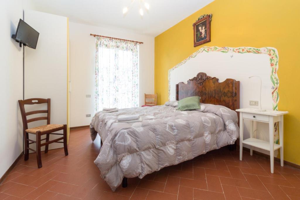 Letto o letti in una camera di B&B Dimora Morelli
