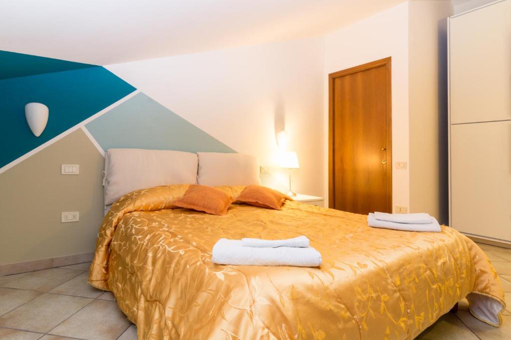 Letto o letti in una camera di B&B Dimora Morelli