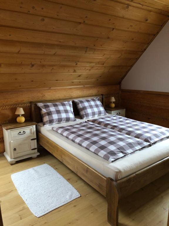 Posteľ alebo postele v izbe v ubytovaní Dom w Karkonoszach
