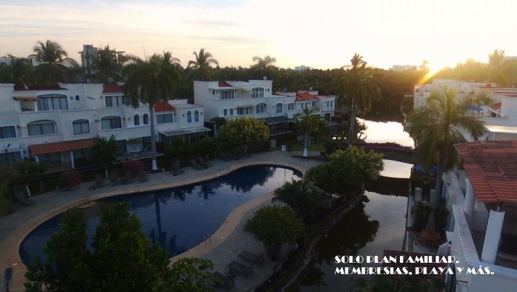 Bazén v ubytování Villa Privada ubicada en el campo de Golf del Hotel Vidanta Mayan Palace nebo v jeho okolí
