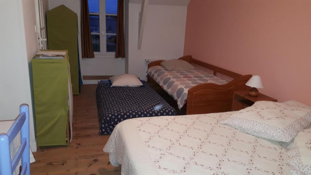Postel nebo postele na pokoji v ubytování Chambres d'hôtes Frehel