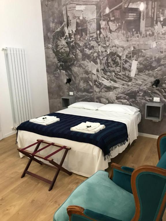Postel nebo postele na pokoji v ubytování Ai Tre Mercati