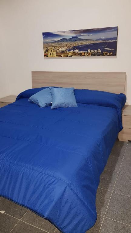 Een bed of bedden in een kamer bij B&B Belvedere