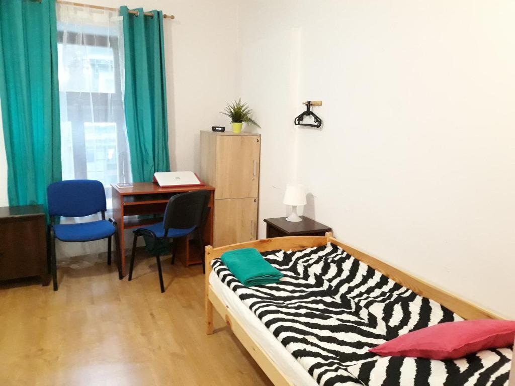 Postel nebo postele na pokoji v ubytování Hostel Gliwice Centrum PARKING