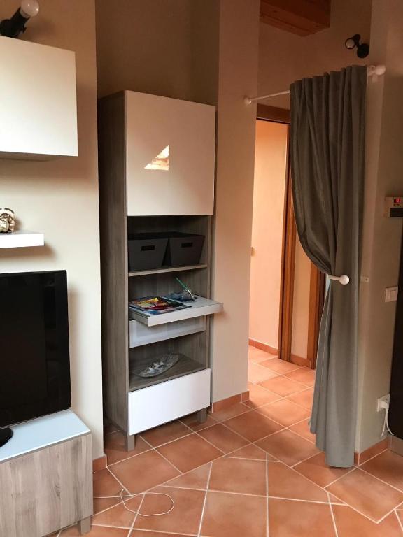 A kitchen or kitchenette at Mansarda Margherita