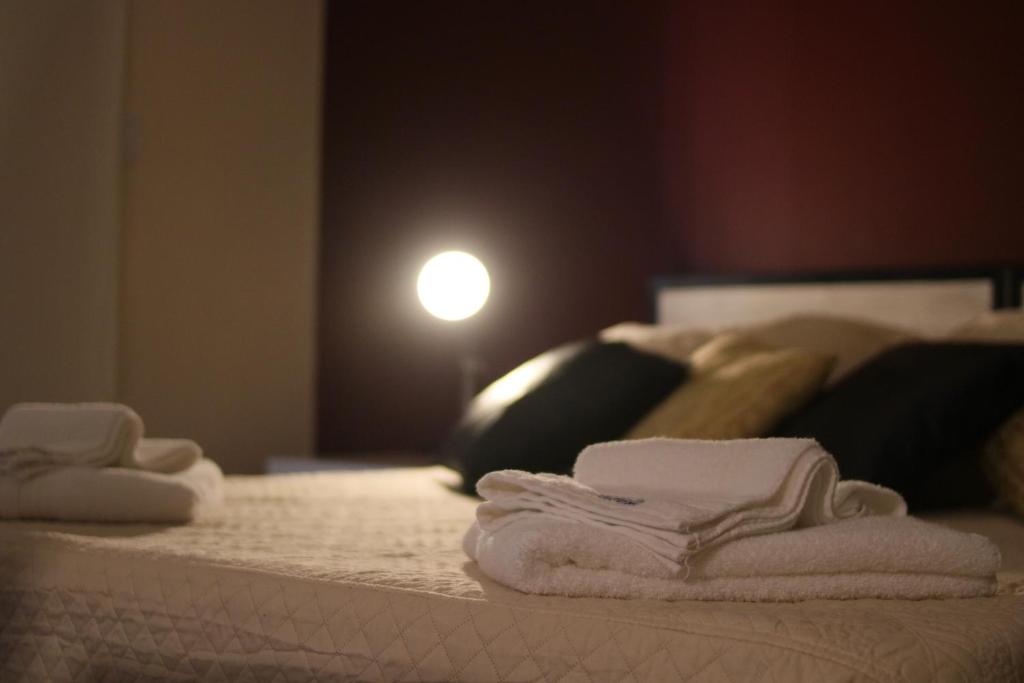 Postel nebo postele na pokoji v ubytování Limay Bed&Breakfast